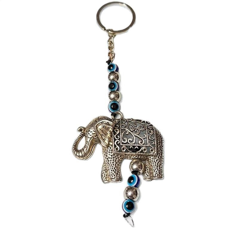 Ojo Turco Keychain Metal Coating T-Shirts