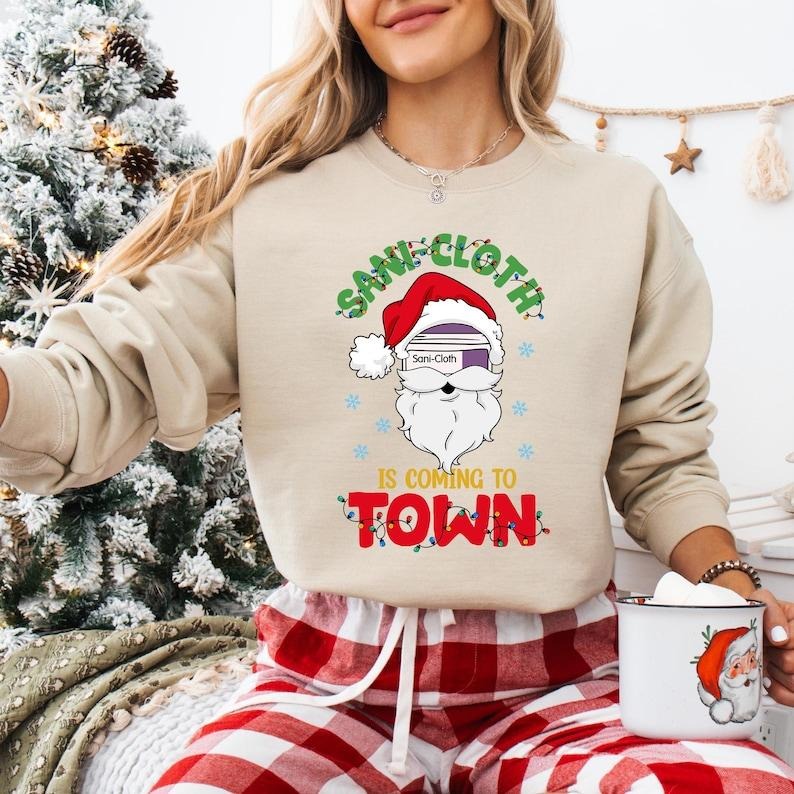 Sani Cloth Is Coming Town Santa Nurse ICU ER Nurse Shirt Xmas Nurse Life RN Nurse Shirt Nurse T-Shirts